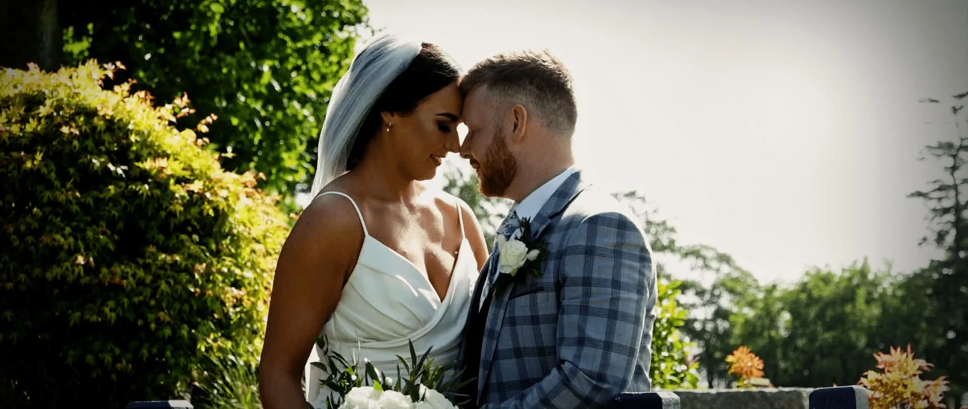 Bride and groom looking at each other in a photo